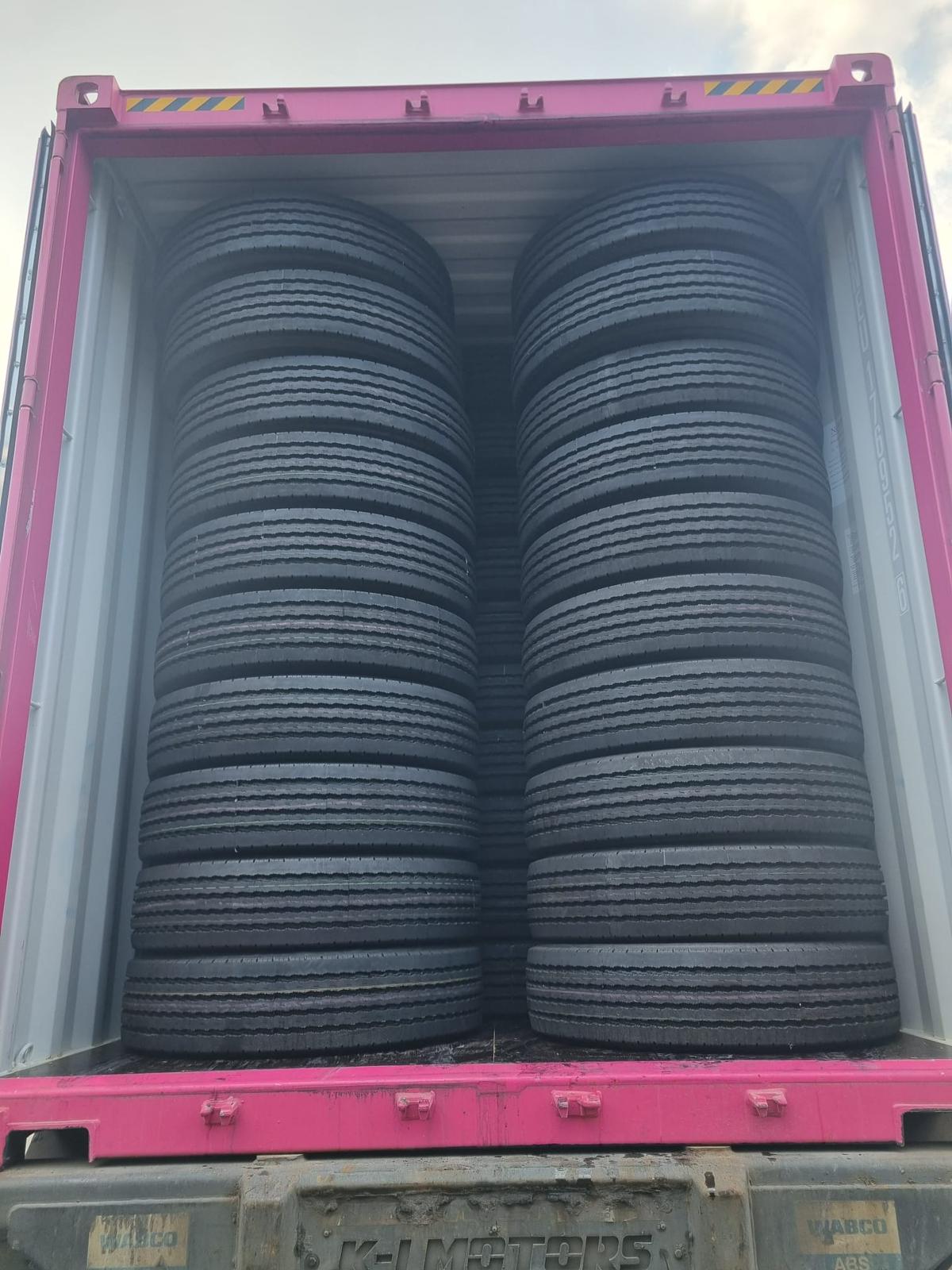 Truck tyres loaded inside shipping container